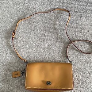 Camel colored Coach crossbody  bag
